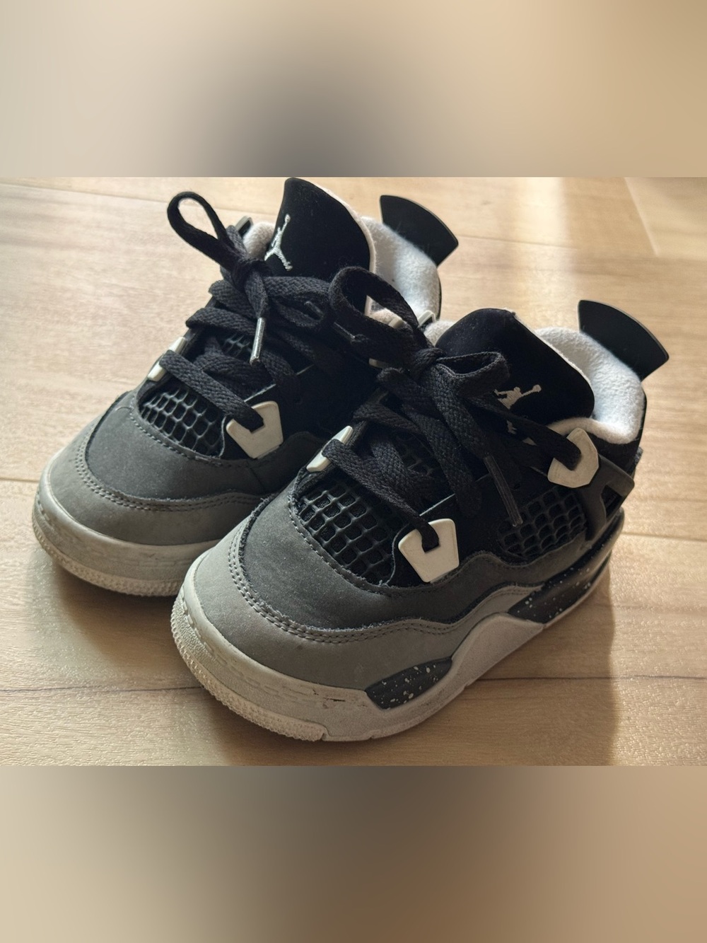 Nike Jordan 4 retro Black and Gray Retro Sneaker 7.5C used